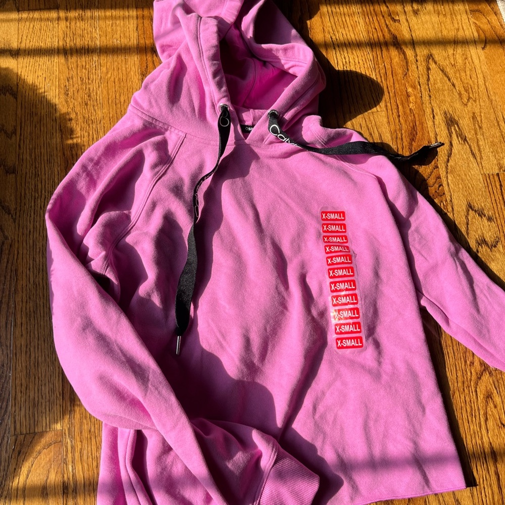 Pink Calvin Klein hoodie